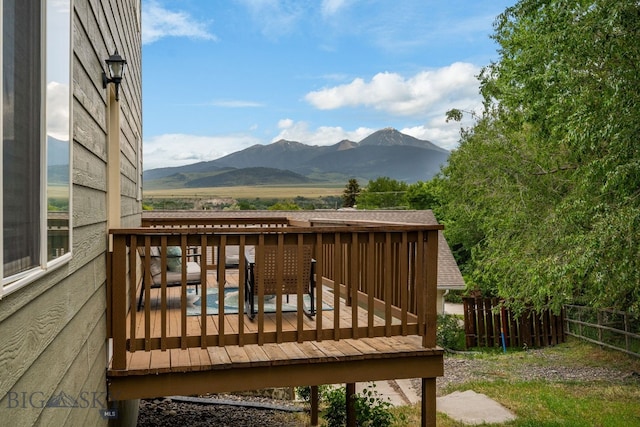 1203 Wineglass Ct Unit B, Livingston, MT 59047 - wooden deck with a mountain view