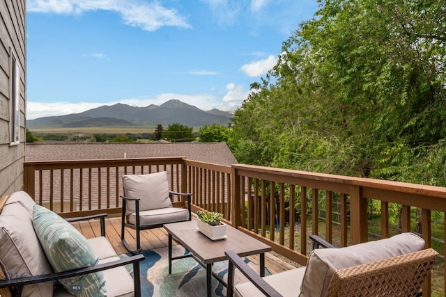 1203 Wineglass Ct Unit B, Livingston, MT 59047 - wooden terrace with a mountain view and an outdoor living space