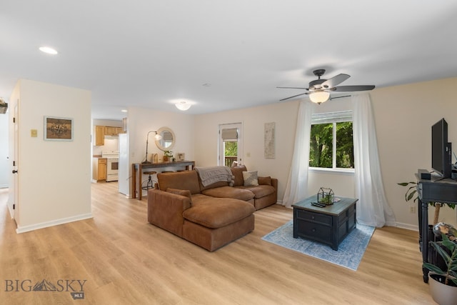 1203 Wineglass Ct Unit B, Livingston, MT 59047 - living room with light wood-style floors, ceiling fan, and recessed lighting