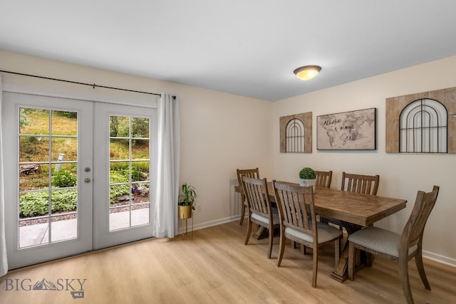 1203 Wineglass Ct Unit B, Livingston, MT 59047 - dining area with french doors and light wood finished floors