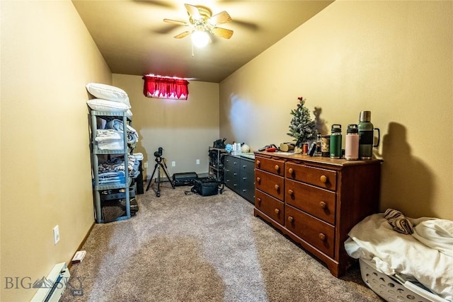 14 Peters Ln, Gardiner, MT 59030 - bedroom featuring light colored carpet, a baseboard radiator, and a ceiling fan