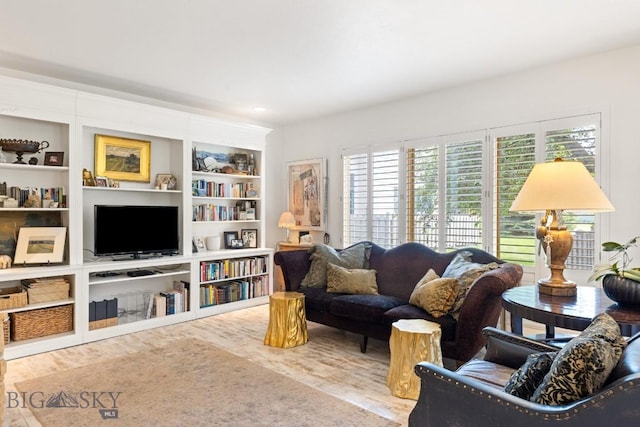 1037 Boylan Rd Unit 1, Bozeman, MT 59715 - living room featuring wood finished floors and built in features