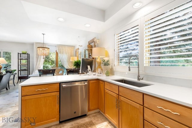 1037 Boylan Rd Unit 1, Bozeman, MT 59715 - kitchen featuring dishwasher, a peninsula, light countertops, recessed lighting, and hanging light fixtures