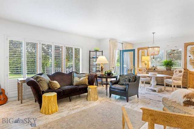 1037 Boylan Rd Unit 1, Bozeman, MT 59715 - living room featuring a chandelier