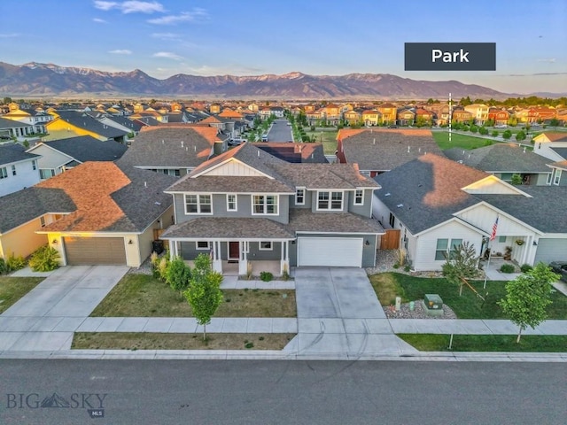 1606 Wyatt Earp Ct, Belgrade, MT 59714 - aerial perspective of suburban area with a mountain backdrop