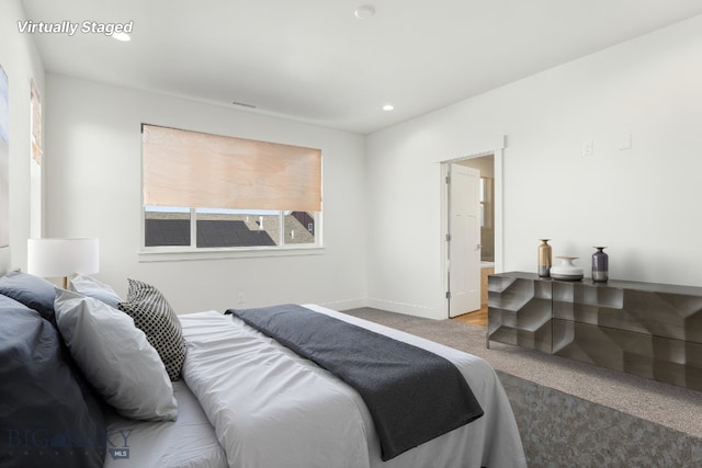1606 Wyatt Earp Ct, Belgrade, MT 59714 - carpeted bedroom with baseboards and recessed lighting