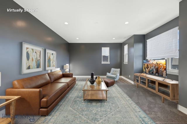 1606 Wyatt Earp Ct, Belgrade, MT 59714 - carpeted living area with recessed lighting
