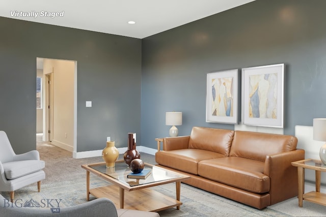 1606 Wyatt Earp Ct, Belgrade, MT 59714 - carpeted living area featuring baseboards