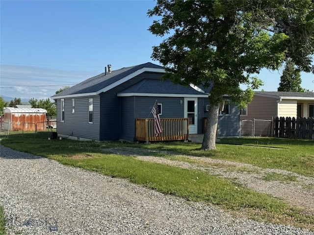 512 W 4th Ave, Big Timber, MT 59011 - view of front of house with a wooden deck