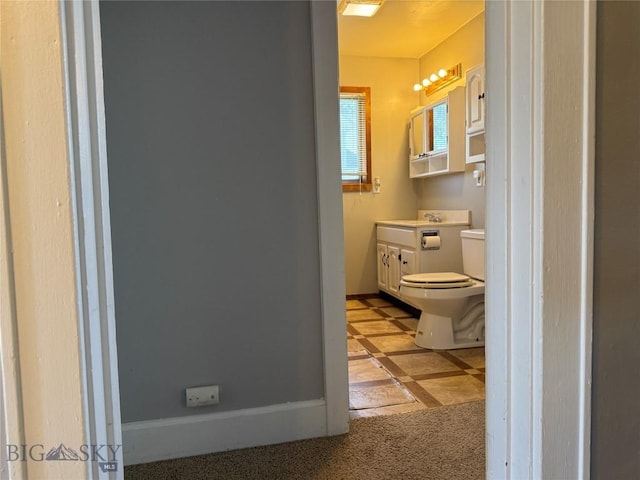512 W 4th Ave, Big Timber, MT 59011 - half bathroom featuring vanity and inlaid floor details