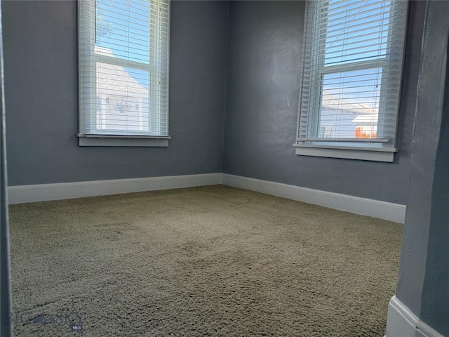 512 W 4th Ave, Big Timber, MT 59011 - spare room with healthy amount of natural light and carpet