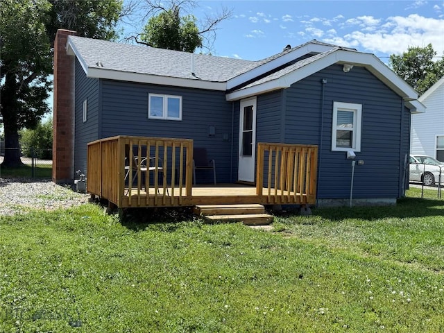 512 W 4th Ave, Big Timber, MT 59011 - rear view of house with a wooden deck and a chimney