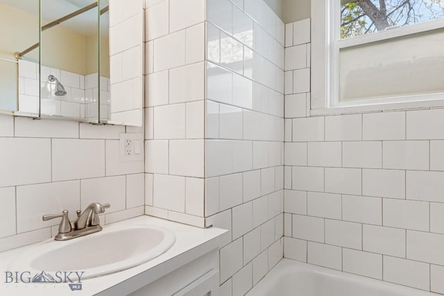 209 N 3rd Ave, Bozeman, MT 59715 - full bath with vanity, shower / washtub combination, and decorative backsplash