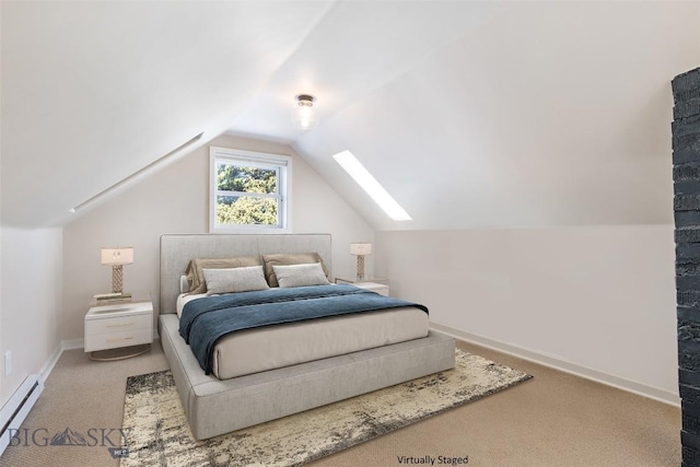 209 N 3rd Ave, Bozeman, MT 59715 - carpeted bedroom featuring a baseboard heating unit, lofted ceiling, and a skylight