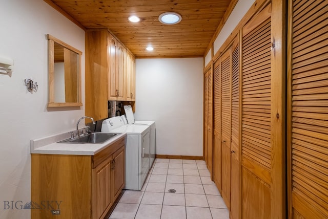 181 Pheasant Ln, Belgrade, MT 59714 - laundry area featuring separate washer and dryer, cabinet space, light tile patterned flooring, recessed lighting, and wooden ceiling