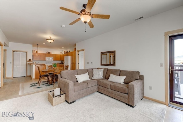 2221 Willow Unit 201-B, Livingston, MT 59047 - living area with ceiling fan, light carpet, and recessed lighting