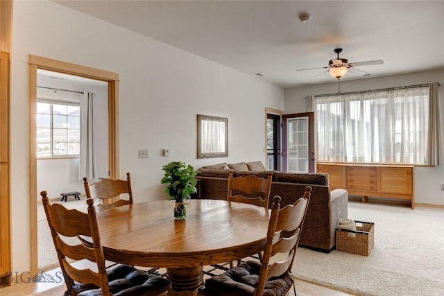 2221 Willow Unit 201-B, Livingston, MT 59047 - dining area with plenty of natural light, a ceiling fan, and light colored carpet
