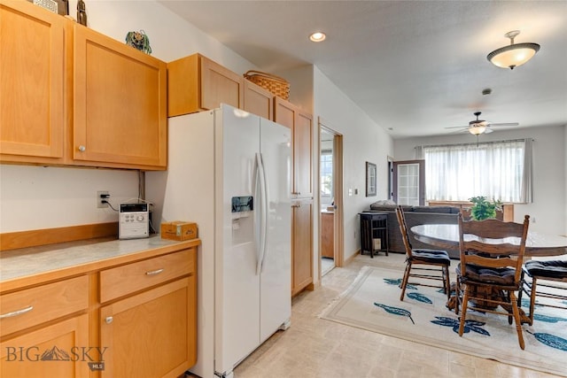 2221 Willow Unit 201-B, Livingston, MT 59047 - kitchen featuring white fridge with ice dispenser, ceiling fan, light countertops, open floor plan, and recessed lighting