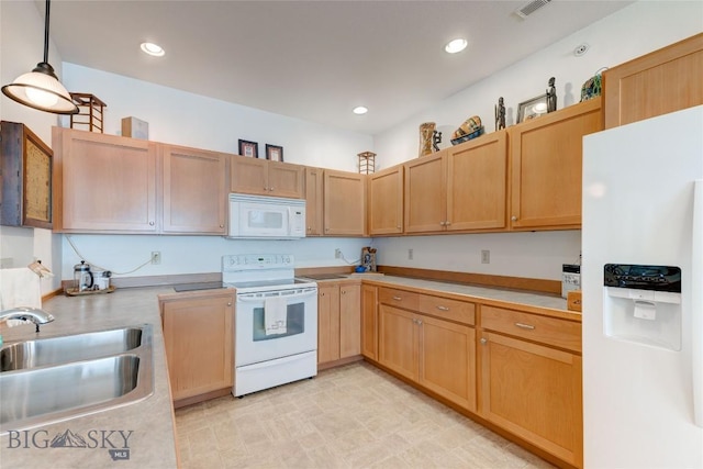 2221 Willow Unit 201-B, Livingston, MT 59047 - kitchen with white appliances, light countertops, decorative light fixtures, and recessed lighting