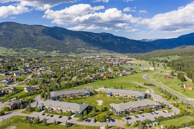 120 Firelight Dr Unit C10, Big Sky, MT 59716 - aerial perspective of suburban area with a mountainous background