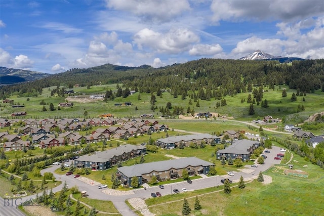 120 Firelight Dr Unit C10, Big Sky, MT 59716 - aerial overview of property's location with mountains and a heavily wooded area