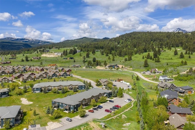 120 Firelight Dr Unit C10, Big Sky, MT 59716 - view of property location featuring a mountainous background and nearby suburban area