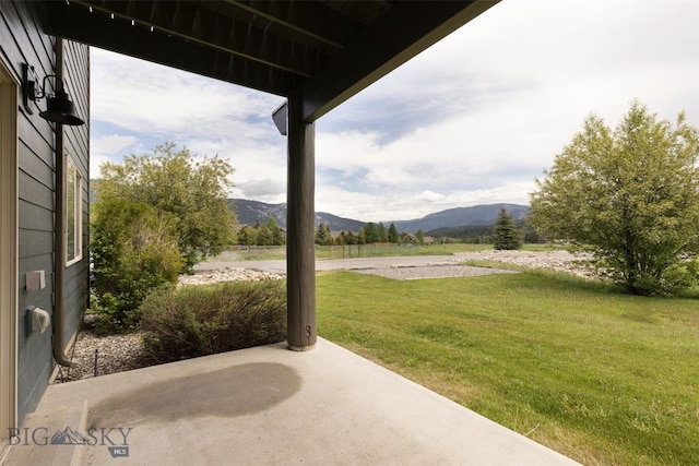 120 Firelight Dr Unit C10, Big Sky, MT 59716 - view of patio with a mountain view