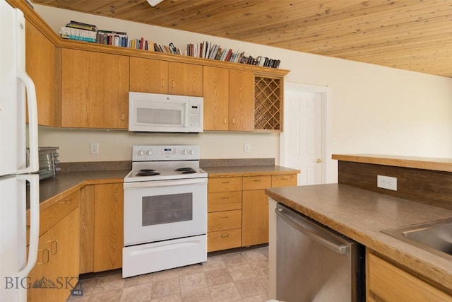 120 Firelight Dr Unit C10, Big Sky, MT 59716 - kitchen with white appliances, wood ceiling, and dark countertops