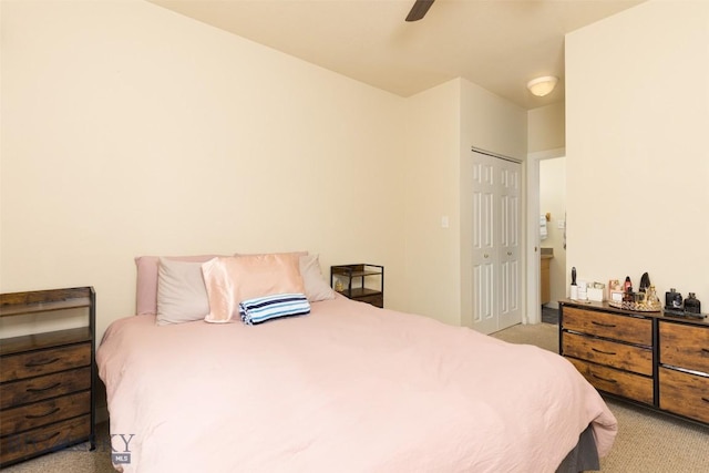 120 Firelight Dr Unit C10, Big Sky, MT 59716 - bedroom featuring light colored carpet, a closet, and a ceiling fan