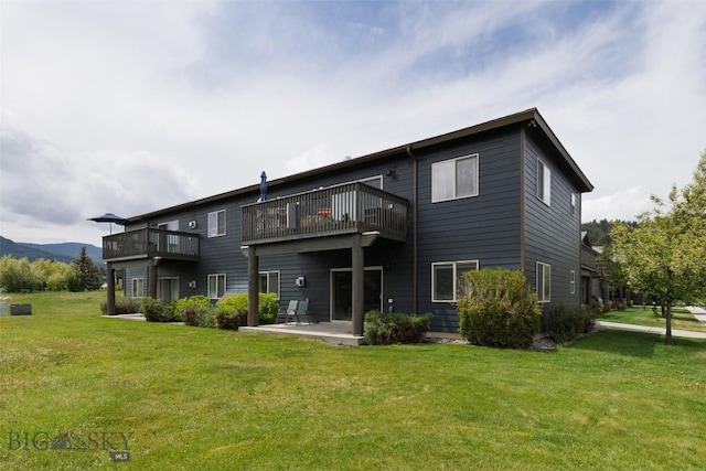 120 Firelight Dr Unit C10, Big Sky, MT 59716 - back of property featuring a patio, a yard, and a deck