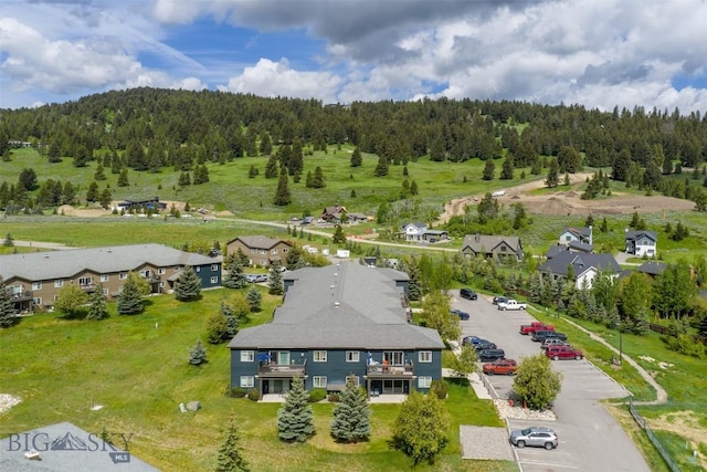 120 Firelight Dr Unit C10, Big Sky, MT 59716 - aerial perspective of suburban area with a forest
