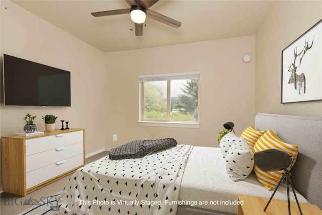120 Firelight Dr Unit C10, Big Sky, MT 59716 - carpeted bedroom featuring a ceiling fan and baseboards
