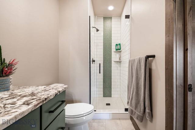16 Tight Loop Dr, Bozeman, MT 59718 - full bath featuring a shower stall, vanity, tile patterned flooring, and recessed lighting