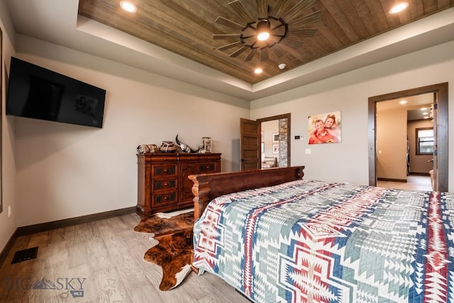 16 Tight Loop Dr, Bozeman, MT 59718 - bedroom with wooden ceiling, a raised ceiling, wood finished floors, recessed lighting, and a ceiling fan