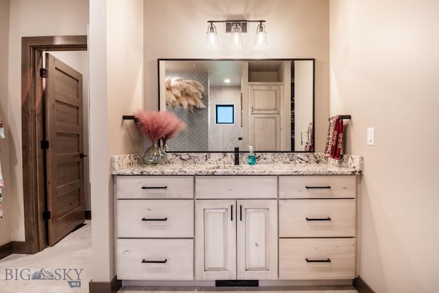 16 Tight Loop Dr, Bozeman, MT 59718 - bathroom featuring vanity and baseboards