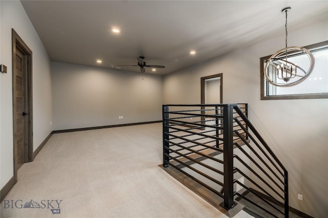 16 Tight Loop Dr, Bozeman, MT 59718 - hallway with an upstairs landing, a chandelier, recessed lighting, and carpet floors