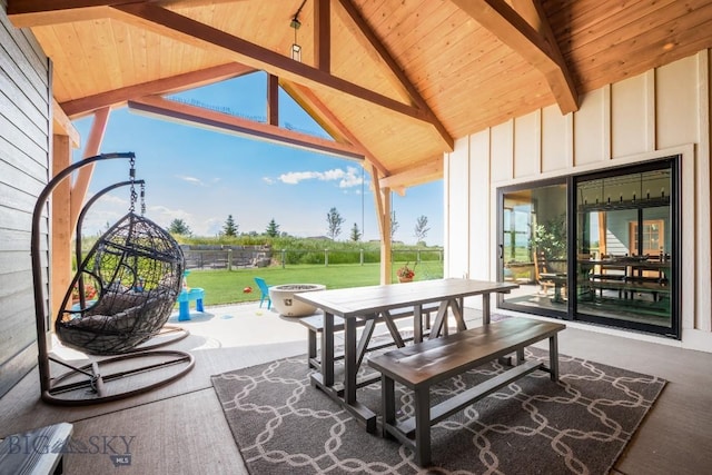 16 Tight Loop Dr, Bozeman, MT 59718 - view of patio featuring outdoor dining area and a fire pit