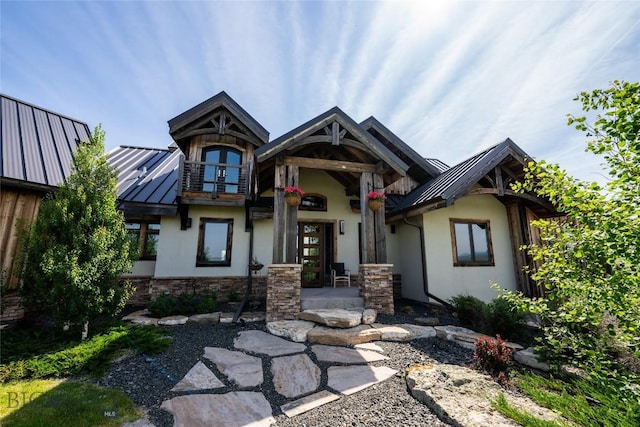 155 Peacemaker Ridge Rd, Belt, MT 59412 - craftsman house featuring a standing seam roof, stucco siding, a metal roof, and stone siding