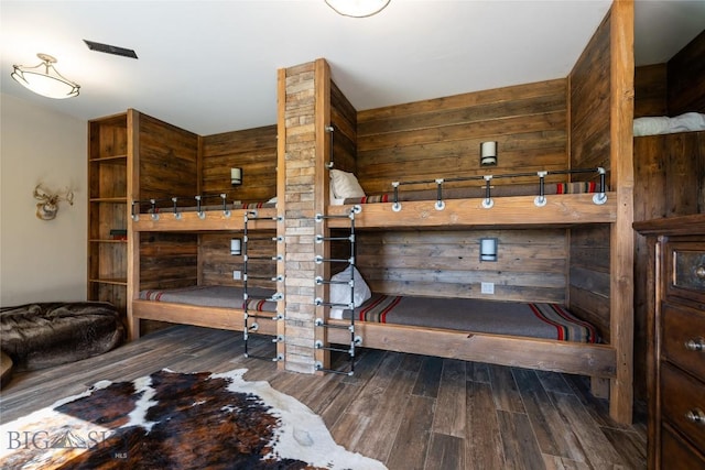155 Peacemaker Ridge Rd, Belt, MT 59412 - bedroom with wood finished floors and wood walls