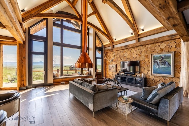 155 Peacemaker Ridge Rd, Belt, MT 59412 - living room with beamed ceiling, high vaulted ceiling, and dark wood-style flooring
