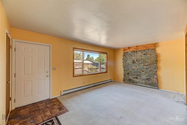 425 Russell, Helena, MT 59602 - entrance foyer featuring a baseboard heating unit and carpet floors