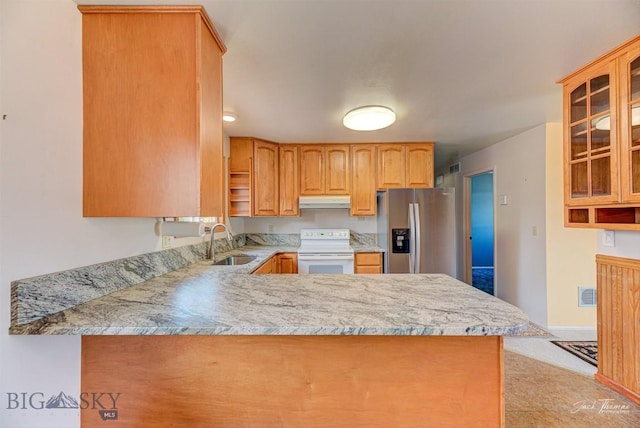 425 Russell, Helena, MT 59602 - kitchen featuring stainless steel refrigerator with ice dispenser, white electric range, under cabinet range hood, glass insert cabinets, and a peninsula