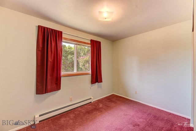 425 Russell, Helena, MT 59602 - carpeted spare room featuring a baseboard radiator and baseboards