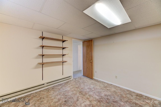 425 Russell, Helena, MT 59602 - finished basement featuring a baseboard heating unit, carpet floors, and a drop ceiling