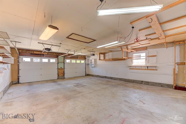 425 Russell, Helena, MT 59602 - garage featuring a garage door opener