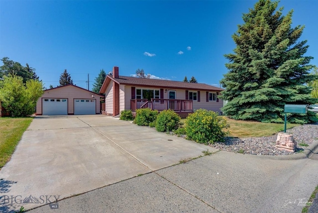 425 Russell, Helena, MT 59602 - single story home with an outbuilding, a garage, a chimney, and a porch