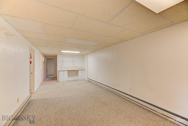 425 Russell, Helena, MT 59602 - finished below grade area with baseboard heating, light colored carpet, a drop ceiling, and an office area
