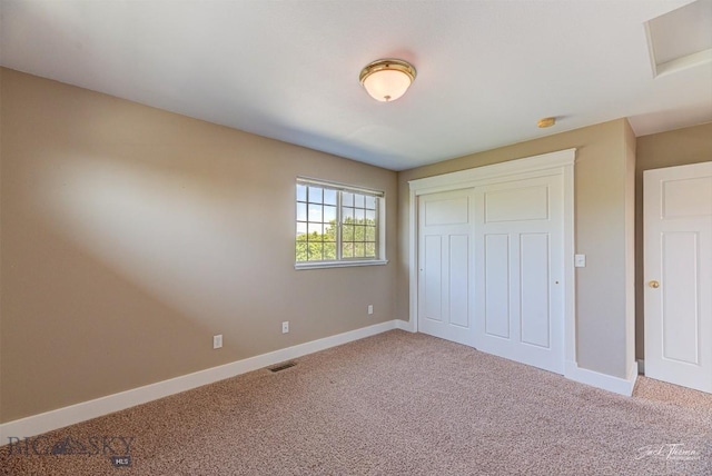 9 Sand Piper, Helena, MT 59602 - unfurnished bedroom featuring carpet and a closet