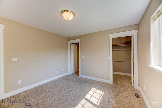 9 Sand Piper, Helena, MT 59602 - unfurnished bedroom with carpet, a walk in closet, and a closet