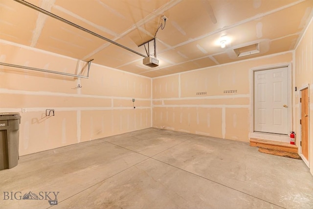 9 Sand Piper, Helena, MT 59602 - garage featuring a garage door opener
